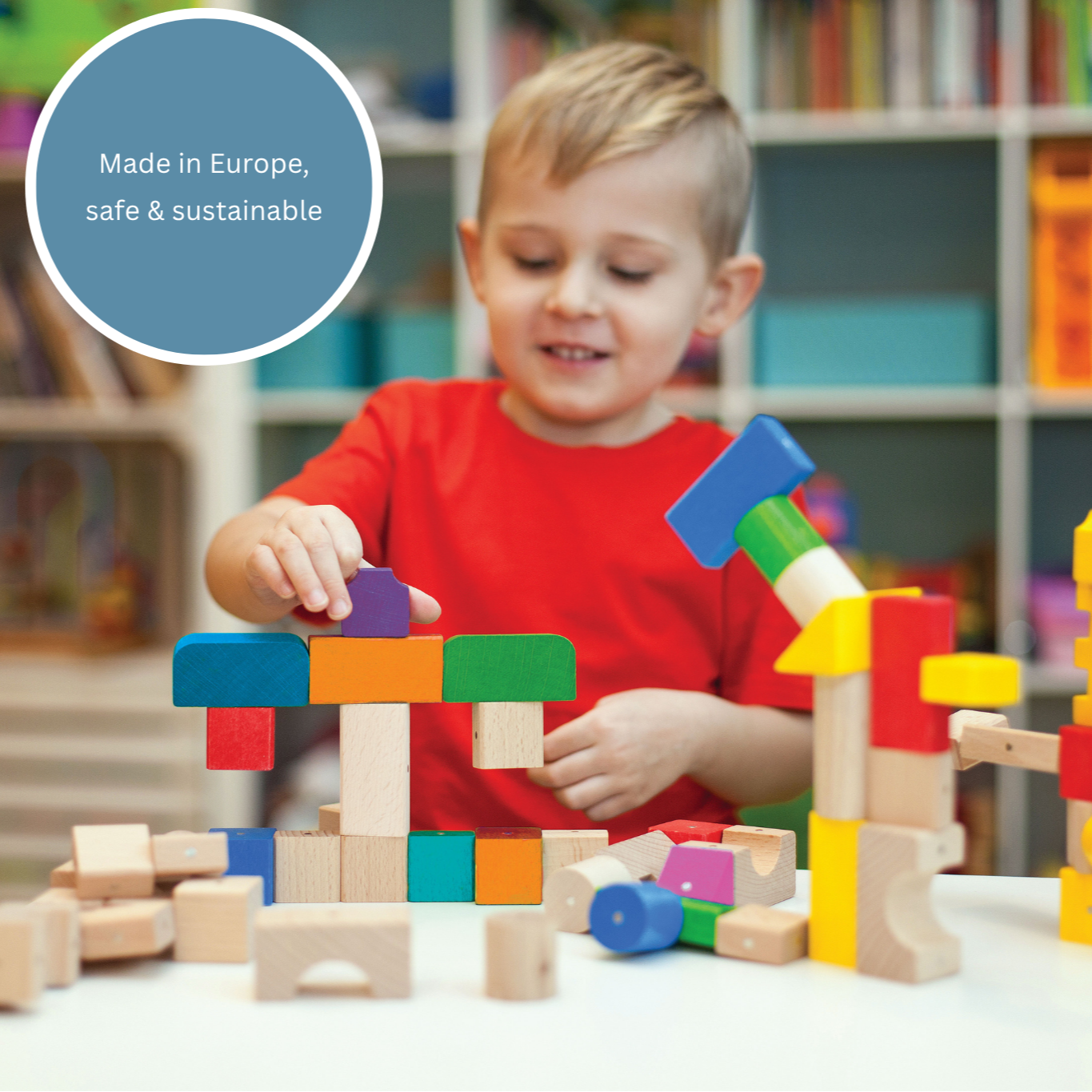Child playing with colorful building blocks in a room with bookshelves.